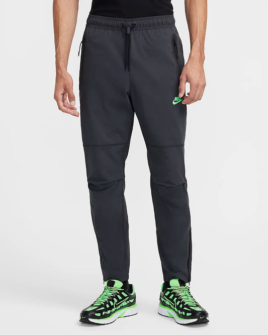 Nike Tech Pantalon tissé - Anthracite/Green Strike